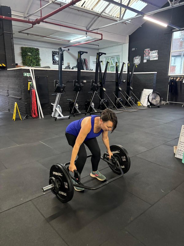 Woman training with weights