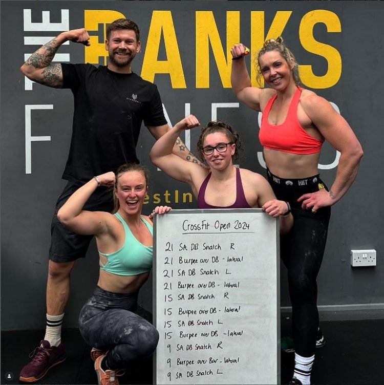 Woman training with weights